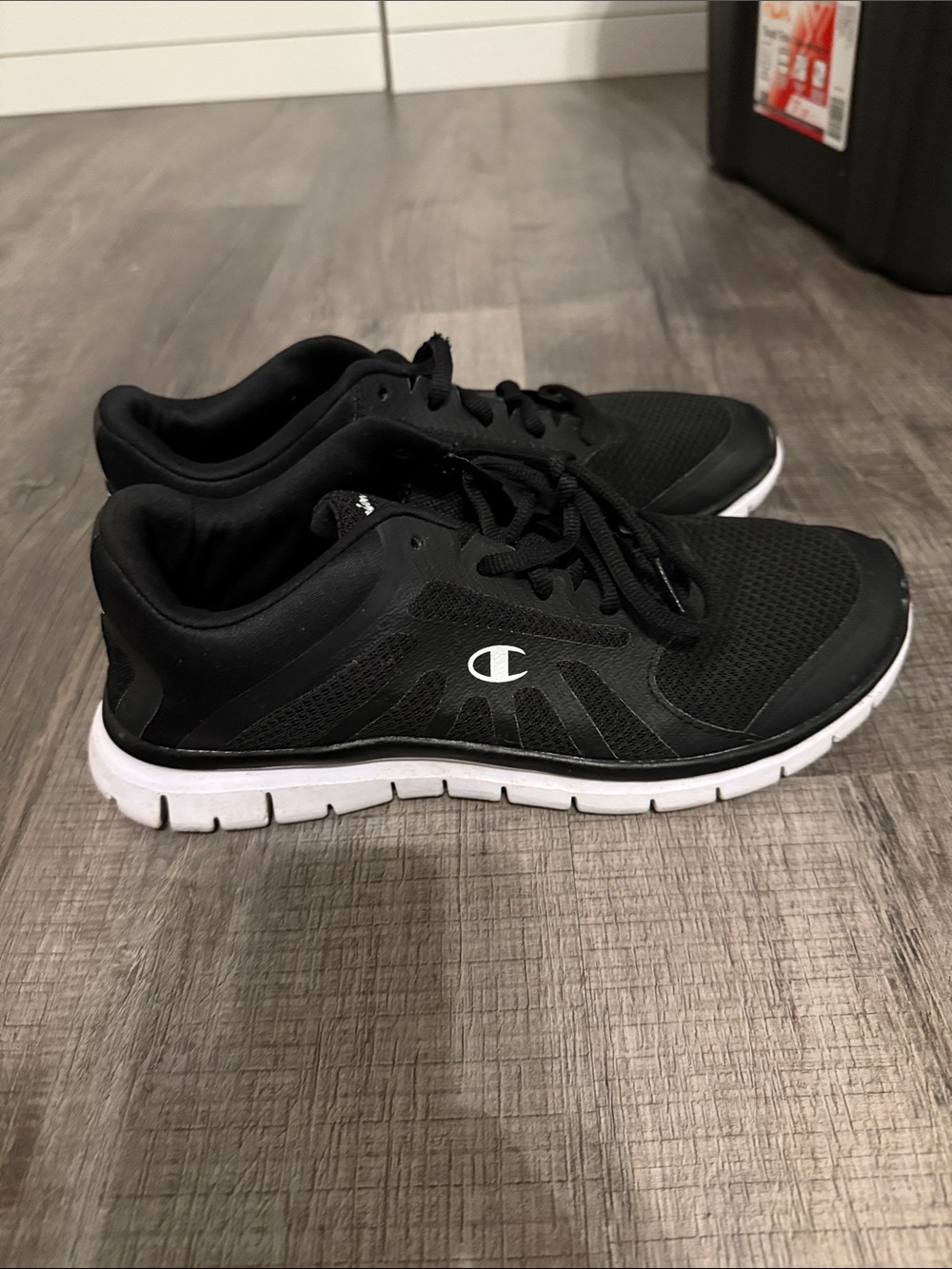 Champion Black Sneakers with White Sole Accent